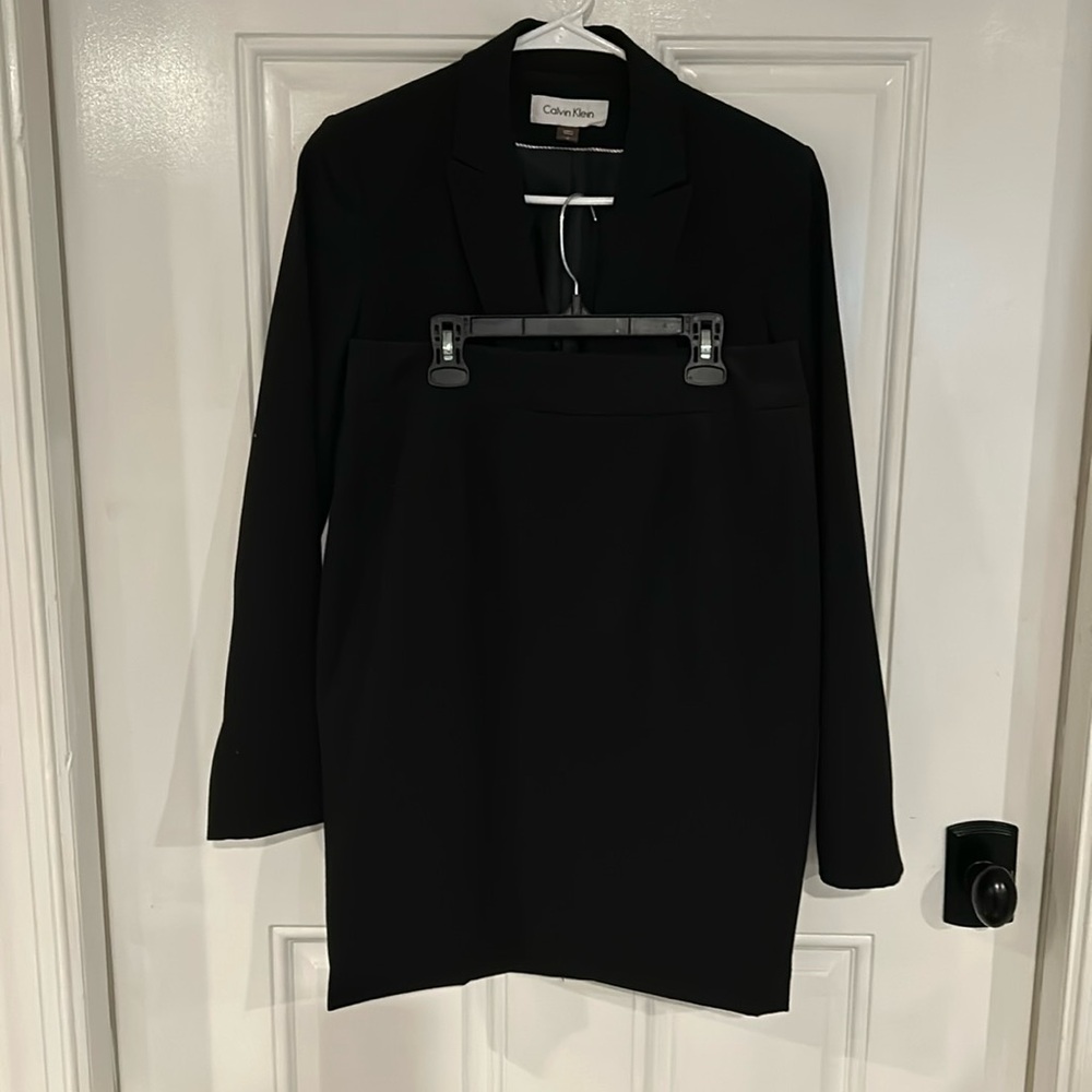 Black business suit.